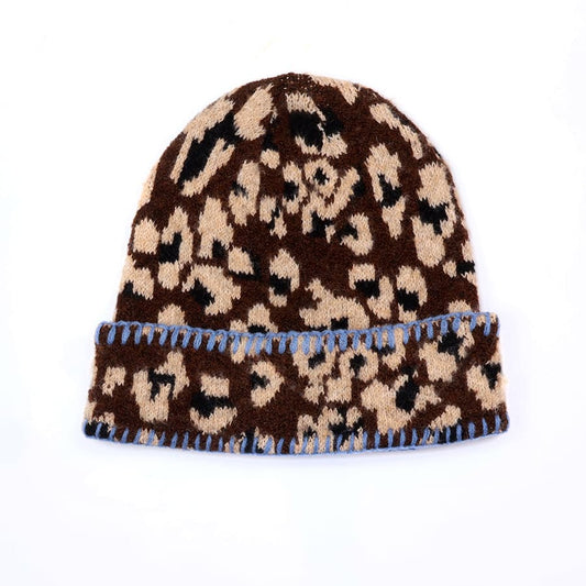 Peggy dark brown leopard print hat with blue blanket stitch trim